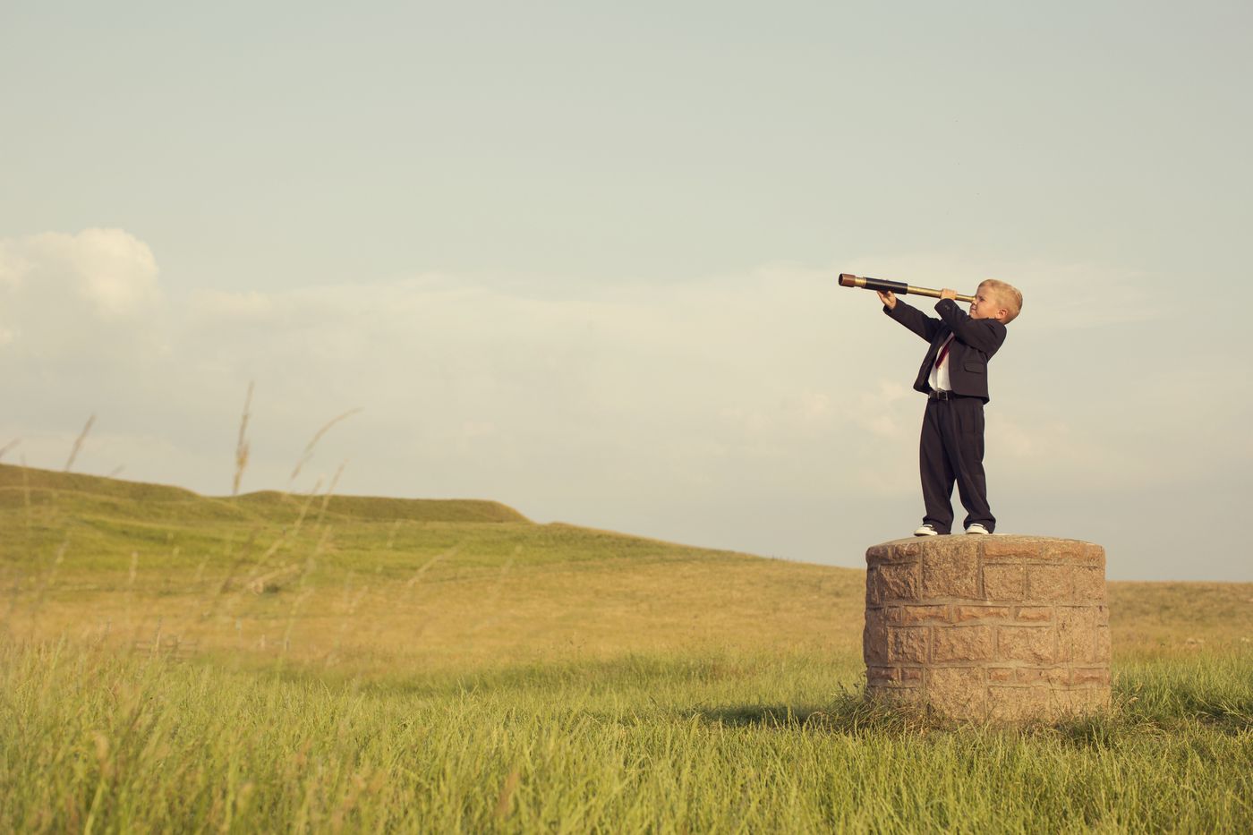 A child with a telescope: seeing far ahead, before the others